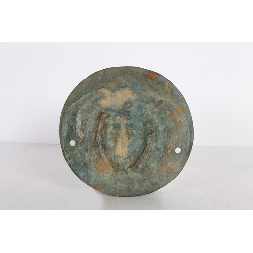 26 - AFTER THE ROMAN A BRONZE PHALERA OF MEDUSA. After the Roman a Bronze Phalera of Medusa, of circular ... 