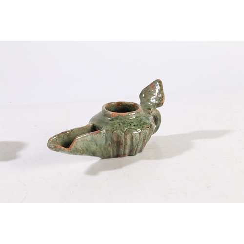 32 - TWO SYRIAN OR PERSIAN GALZED OIL LAMPS, 10TH/11TH CENTURY AD, (2). The first with a palmette-shaped ... 