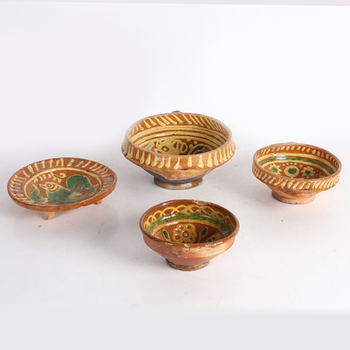 36 - FOUR 17TH CENTURY DUTCH SLIPWARE POTTERY BOWLS/DISHES. Four 17th century Dutch slipware pottery bowl... 