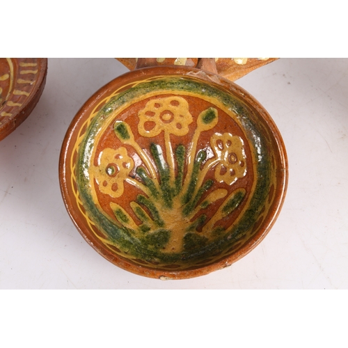 36 - FOUR 17TH CENTURY DUTCH SLIPWARE POTTERY BOWLS/DISHES. Four 17th century Dutch slipware pottery bowl... 