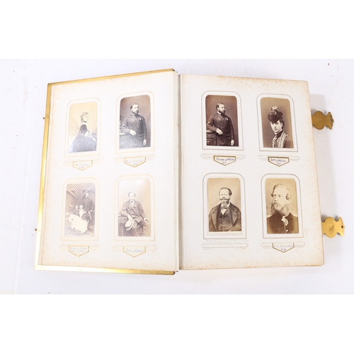 63 - A GOOD VICTORIAN CARTE DE VISITE PHOTOGRAPH ALBUM. The album with a purple tooled binding containing... 