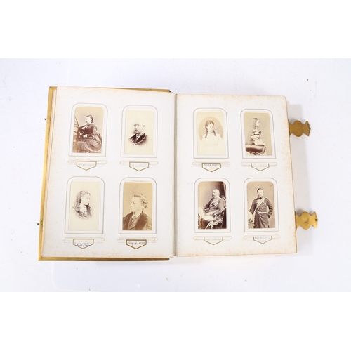 63 - A GOOD VICTORIAN CARTE DE VISITE PHOTOGRAPH ALBUM. The album with a purple tooled binding containing... 