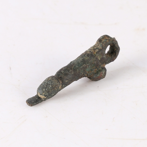 7 - A RARE ROMAN 3RD CENTURY AD BRONZE PENDANT PHALLIC. Looped and with a tongue protruding, 5cm long.
F... 