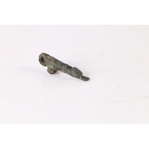 7 - A RARE ROMAN 3RD CENTURY AD BRONZE PENDANT PHALLIC. Looped and with a tongue protruding, 5cm long.
F... 