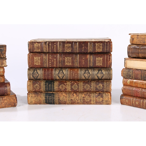 82 - A COLLECTION OF 18TH AND 19TH CENTURY LEATHER BOUND BOOKS. A collection of 18th and 19th century lea... 