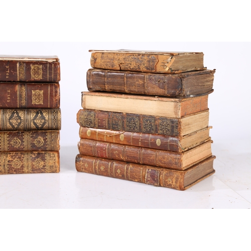 82 - A COLLECTION OF 18TH AND 19TH CENTURY LEATHER BOUND BOOKS. A collection of 18th and 19th century lea... 