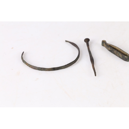 9 - ROMAN ARTIFACTS (3). To include a bracelet, a hairpin and a pair of tweezers, (3).
Found Suffolk.