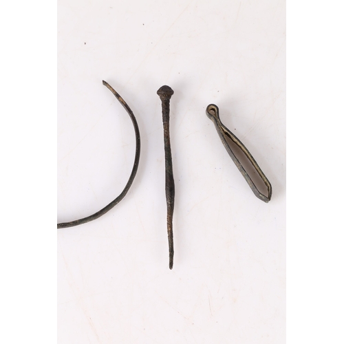 9 - ROMAN ARTIFACTS (3). To include a bracelet, a hairpin and a pair of tweezers, (3).
Found Suffolk.