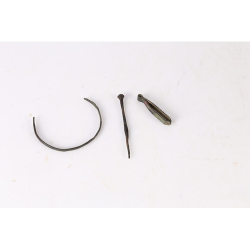 9 - ROMAN ARTIFACTS (3). To include a bracelet, a hairpin and a pair of tweezers, (3).
Found Suffolk.