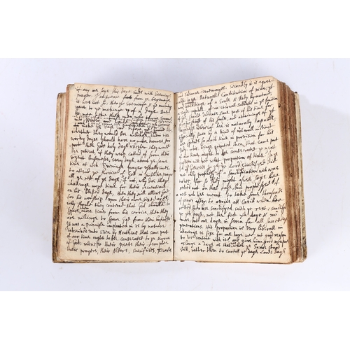 92 - A 17TH/18TH CENTURY HANDWRITTEN BOOK. A 17th/18th century handwritten book, handwritten book appears... 