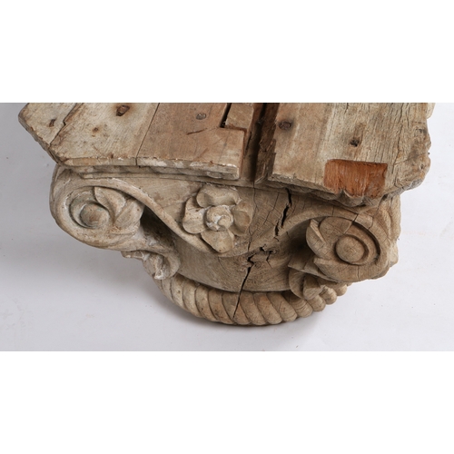 112 - A PAIR OF CARVED OAK CORINTHIAN COLUMN CAPITALS. with acanthus leaf, scroll and rope twist carved de... 