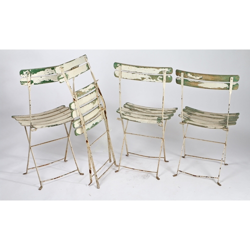 74 - FOUR FRENCH FOLDING PATIO CHAIRS. With painted slatted backs and seats, 45.5cm wide.