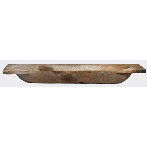 98 - A SUBSTANTIAL 19TH CENTURY DOUGH TROUGH. with oval dished centre and flattened ends, 238.5cm wide, 5... 