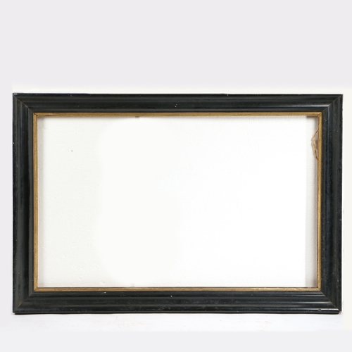 109 - A VICTORIAN EBONISED AND GILT PICTURE FRAME. with gilt slip, 92.5cm wide, 139cm high.