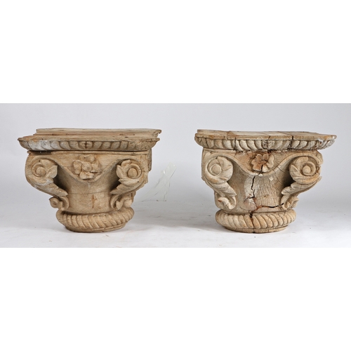 112 - A PAIR OF CARVED OAK CORINTHIAN COLUMN CAPITALS. with acanthus leaf, scroll and rope twist carved de... 