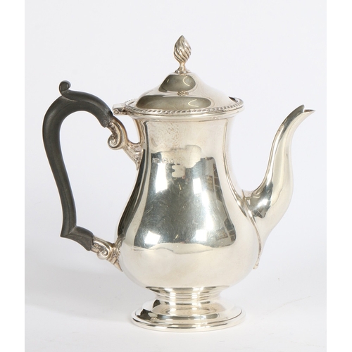 272 - A BACHELOR'S SILVER COFFEE POT. WALKER AND HALL, LONDON 1934, 11.3OZ, 18CM HIGH. A bachelor's silver... 