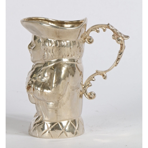 277 - A SMALL SILVER 'TOBY' CREAM JUG MODELLED AS A GENTLEMAN. PROBABLY GERMAN. A small silver 'Toby' crea... 