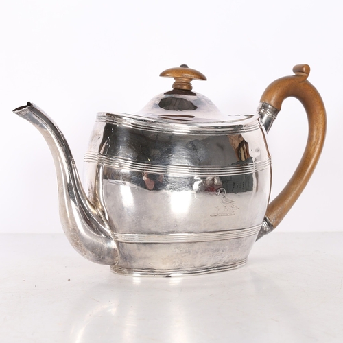 281 - A GEORGE III SILVER TEAPOT. London 1801, maker Robert & David Hennell, with fruitwood handle and ter... 