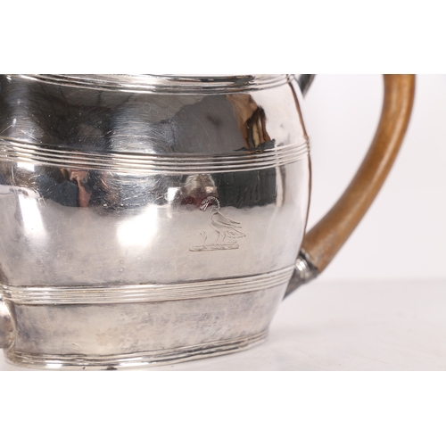 281 - A GEORGE III SILVER TEAPOT. London 1801, maker Robert & David Hennell, with fruitwood handle and ter... 