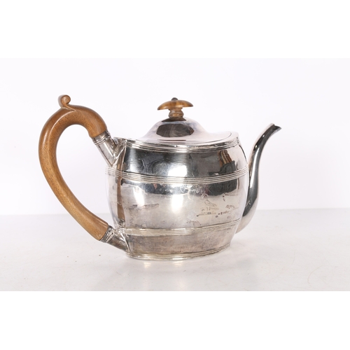 281 - A GEORGE III SILVER TEAPOT. London 1801, maker Robert & David Hennell, with fruitwood handle and ter... 