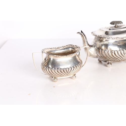 282 - AN EDWARD VII SILVER THREE PIECE TEA SET. London 1901, maker William Hutton & Sons Ltd. consisting o... 