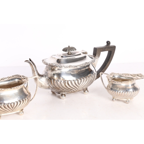 282 - AN EDWARD VII SILVER THREE PIECE TEA SET. London 1901, maker William Hutton & Sons Ltd. consisting o... 