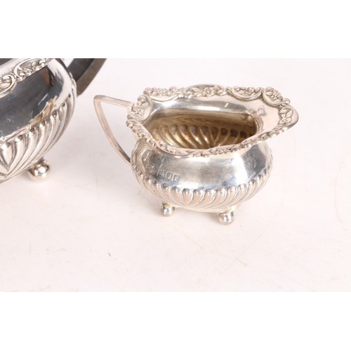 282 - AN EDWARD VII SILVER THREE PIECE TEA SET. London 1901, maker William Hutton & Sons Ltd. consisting o... 