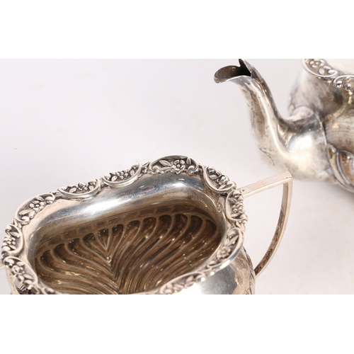 282 - AN EDWARD VII SILVER THREE PIECE TEA SET. London 1901, maker William Hutton & Sons Ltd. consisting o... 