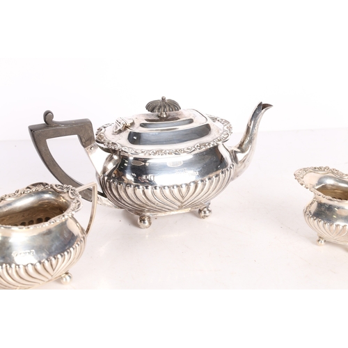 282 - AN EDWARD VII SILVER THREE PIECE TEA SET. London 1901, maker William Hutton & Sons Ltd. consisting o... 