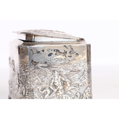 283 - A LATE VICTORIAN SILVER TEA CADDY. London 1896, Maker Thomas Hayes, with repousse decoration depicti... 