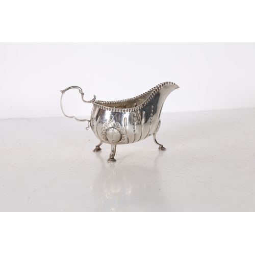 284 - AN 18TH CENTURY IRISH SILVER SAUCEBOAT. Dublin, marks rubbed, maker Matthew West, with acanthus leaf... 