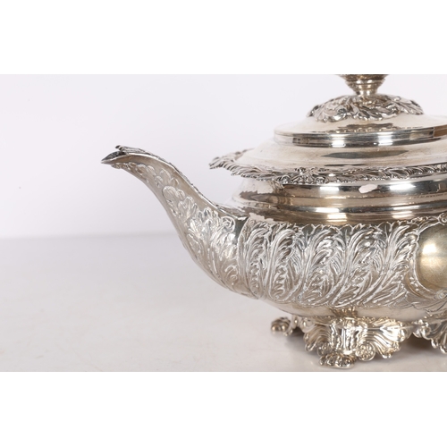 289 - A LATE GEORGE III/ EARLY GEORGE IV SILVER TEAPOT. London 1820, maker Joseph Angell I, with acanthus ... 