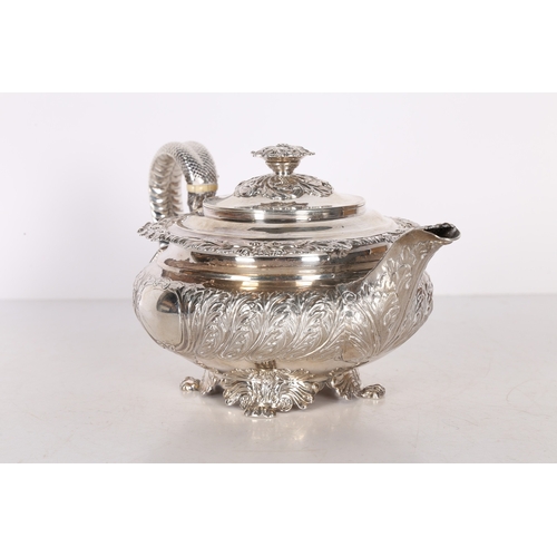 289 - A LATE GEORGE III/ EARLY GEORGE IV SILVER TEAPOT. London 1820, maker Joseph Angell I, with acanthus ... 