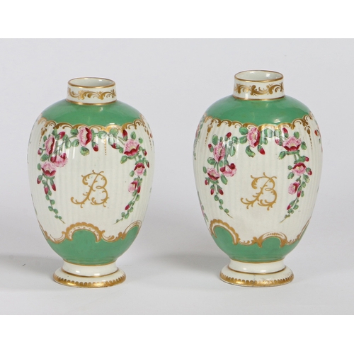 298 - A PAIR OF RARE 18TH CENTURY WORCESTER OVAL TEA CANISTERS, HAND PAINTED WITH ONGLAZE COLOURS. A pair ... 