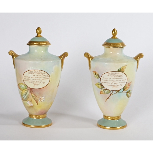 299 - A PAIR OF AYNSLEY 'FINE ART COLLECTION' PORCELAIN, TWIN HANDLED LIDDED VASES. A pair of Aynsley 'Fin... 