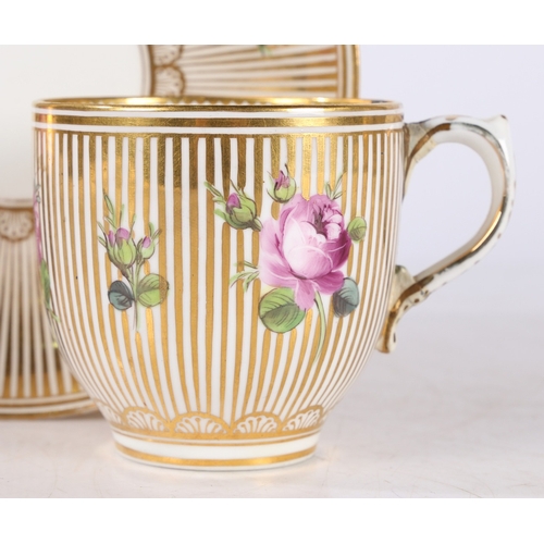 300 - MINTON CUP AND SAUCER DECORATED WITH ROSES ON GOLD STRIPED GROUND. Minton cup and saucer decorated w... 