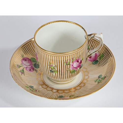 300 - MINTON CUP AND SAUCER DECORATED WITH ROSES ON GOLD STRIPED GROUND. Minton cup and saucer decorated w... 