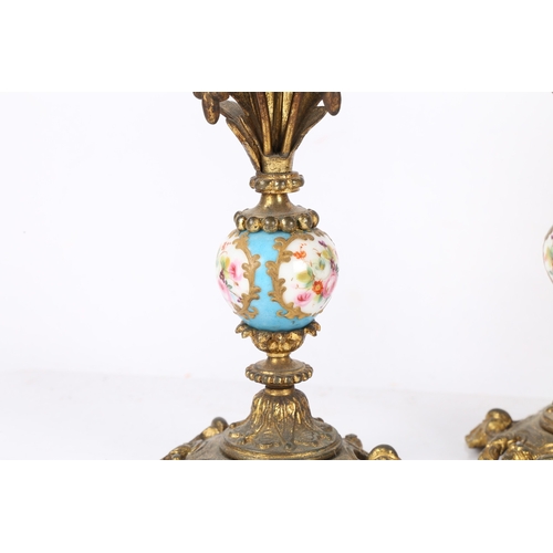 303 - A PAIR OF 19TH CENTURY FRENCH 'SEVRES' STYLE PORCELAIN GILT CANDLESTICKS. A pair of 19th century Fre... 