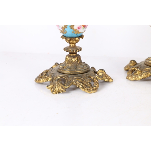 303 - A PAIR OF 19TH CENTURY FRENCH 'SEVRES' STYLE PORCELAIN GILT CANDLESTICKS. A pair of 19th century Fre... 