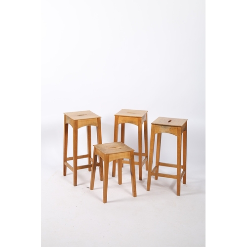 32 - ANDREW BECKWITH FURNITURE, A PAIR OF HIGH STOOLS AND A LOW STOOL. having a square seat with an ellip... 