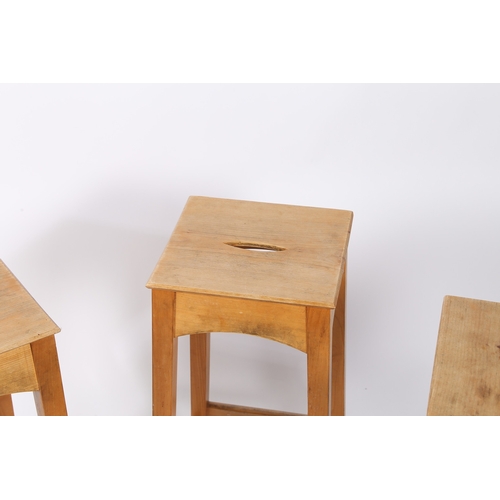 32 - ANDREW BECKWITH FURNITURE, A PAIR OF HIGH STOOLS AND A LOW STOOL. having a square seat with an ellip... 