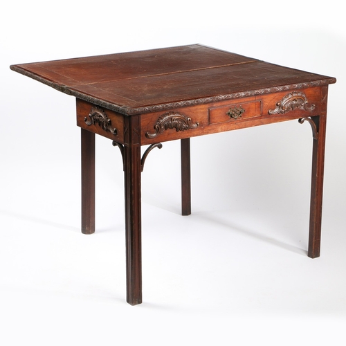 320 - AN EARLY GEORGE III CARVED MAHOGANY CARD TABLE. The hinged rectangular top opening to reveal a toole... 