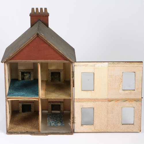 326 - A 19TH CENTURY DOLLS HOUSE. The apex roof with a four chimney stack above a red body with two window... 