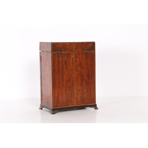 327 - A REGENCY SATINWOOD AND POLYCHROME PAINTED TABLE CABINET. modelled as a stylised wardrobe, the ebony... 