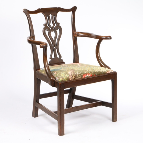 332 - A GEORGE III MAHOGANY CARVER CHAIR. the swept top rail above a pierced vase shaped splat, the scroll... 