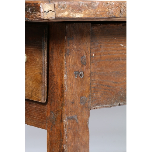 343 - AN 18TH CENTURY OAK FARMHOUSE TABLE. An 18th Century oak farmhouse table, having a four plank top ab... 