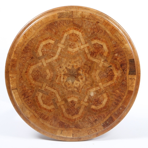 350 - A 19TH CENTURY NEW ZEALAND SPECIMEN PARQUETRY CIRCULAR OCCASIONAL TABLE. The geometric inlaid top by... 