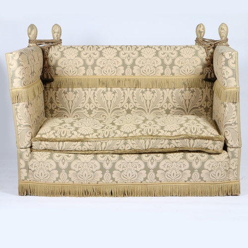 386 - AN EARLY 20TH CENTURY KNOWLE SOFA. An Early 20th century Knowle sofa, having floral upholstery, 162c... 