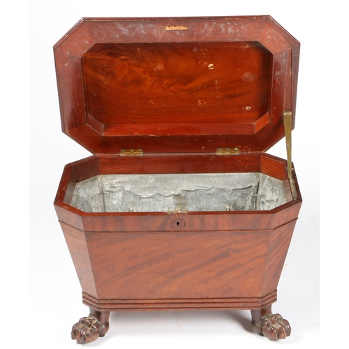 389 - A GEORGE III MAHOGANY CELLARETTE OR WINE COOLER OF SARCOPHAGUS FORM. A George III mahogany cellarett... 