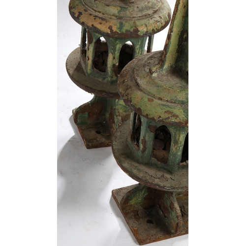 42 - A PAIR OF RAILWAY SIGNAL FINIALS. the pointed tapering tops above arch pierced octagonal centres and... 